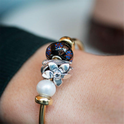Decemberi Nárcisz Bead - Trollbeads Ékszerek Magyarország